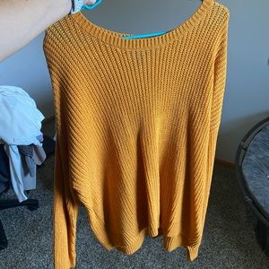 Never worn, yellow sweater.